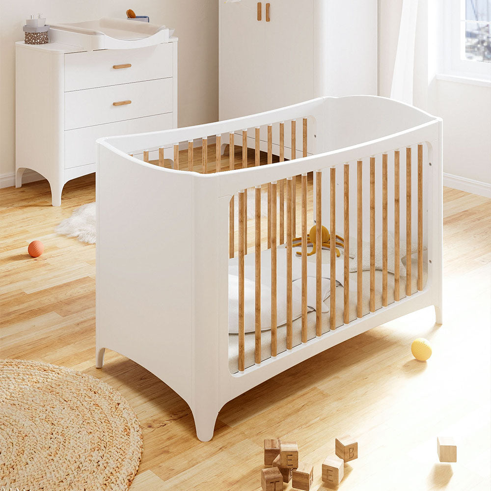 NEREE LIT Bed 60X120 - Neige with wooden slats on a wooden floor in a bright room.