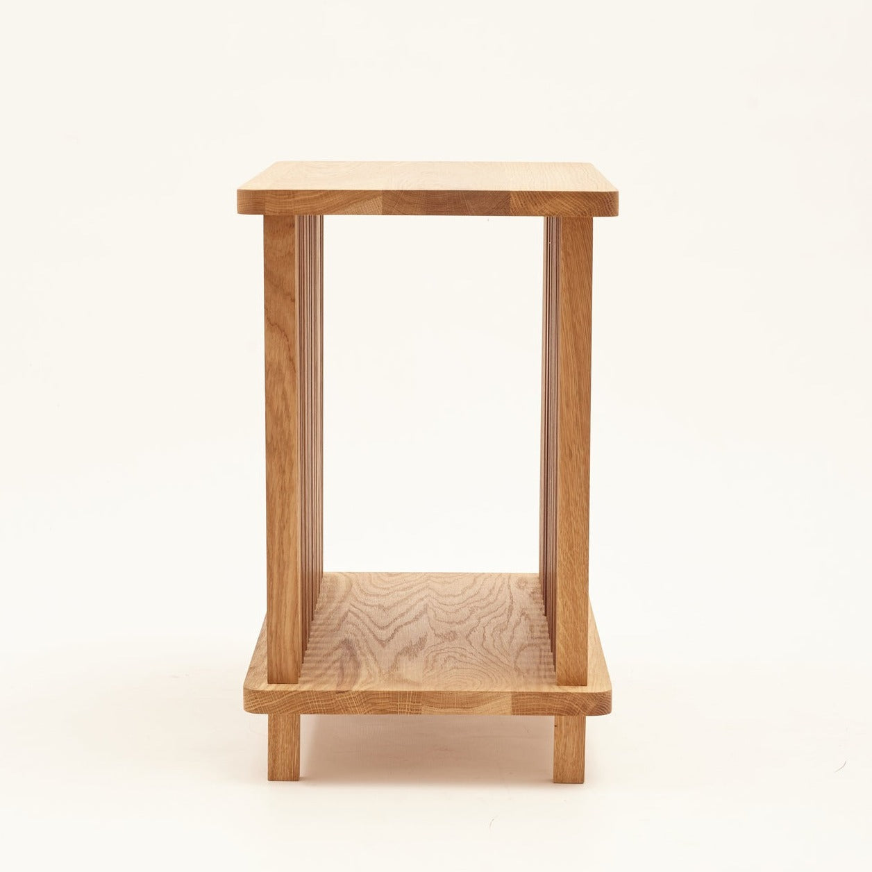 QUBANC Newspaper Holder Oak-natural side view-white background