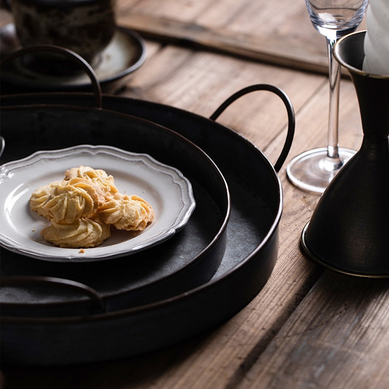 Piatto di ferro decorativo rotondo retrò in stile europeo con maniglie