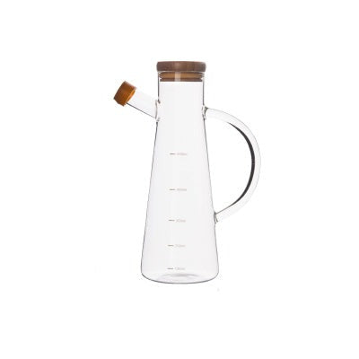 Bottiglia per olio in vetro trasparente con manico