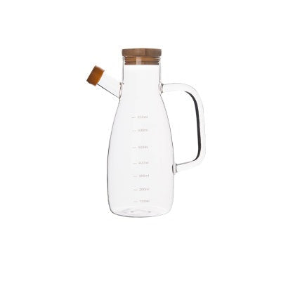 Bottiglia per olio in vetro trasparente con manico