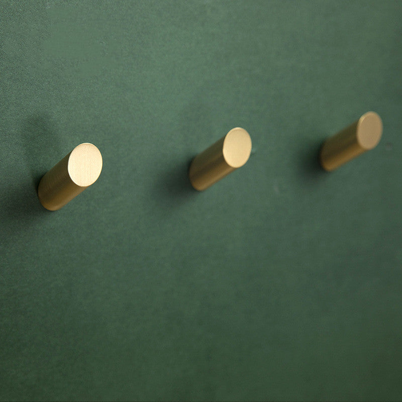 Gancio d'ottone per il bagno a muro