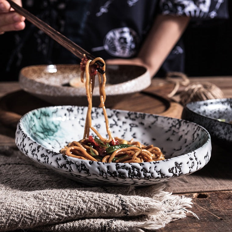 Piatto in ceramica di alta qualità a forma di ostrica