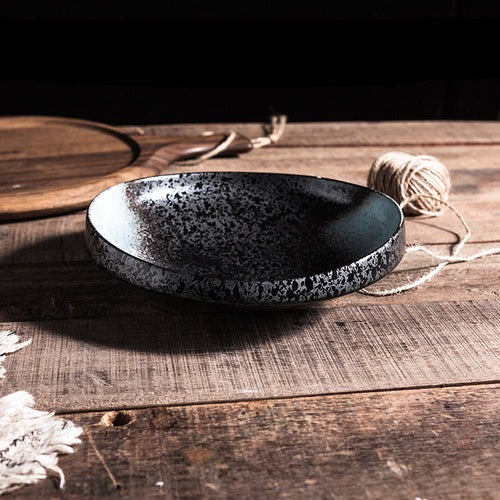 Piatto in ceramica di alta qualità a forma di ostrica