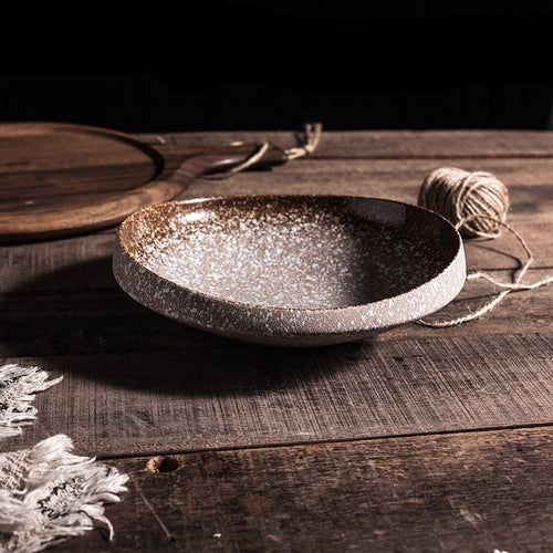 Piatto in ceramica di alta qualità a forma di ostrica