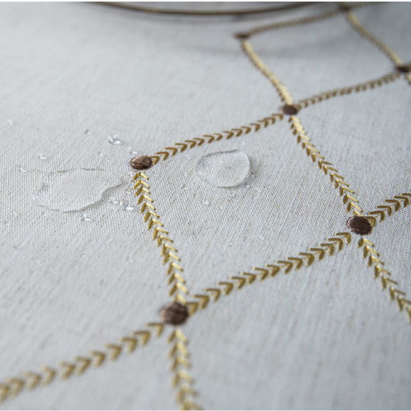 Tovaglia impermeabile ricamata geometrica in lino nordico