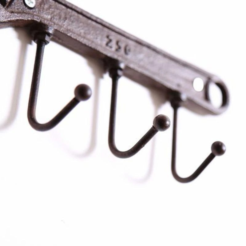 Ganci da parete in ghisa retrò