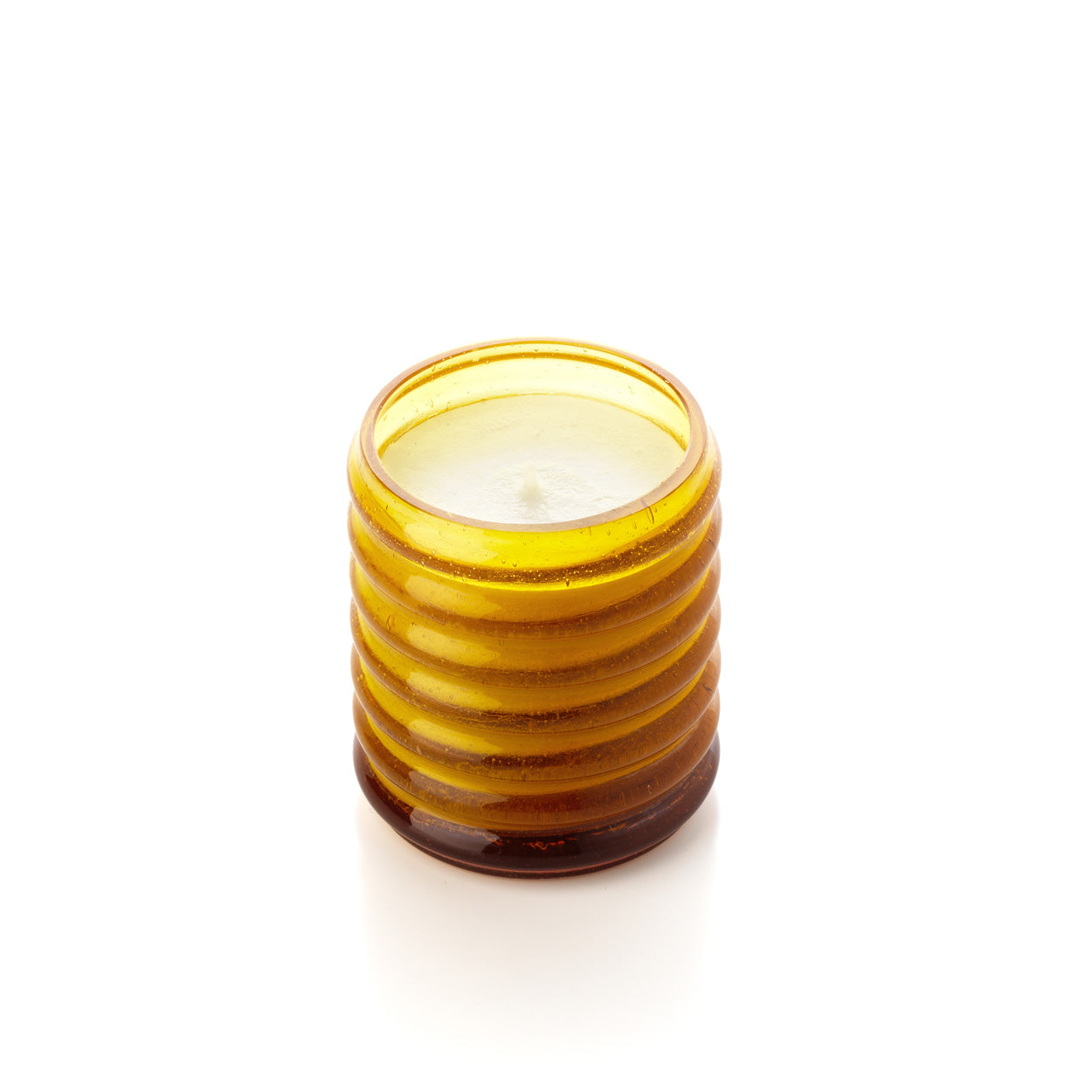 Wide yellow glass candle holder on a white background