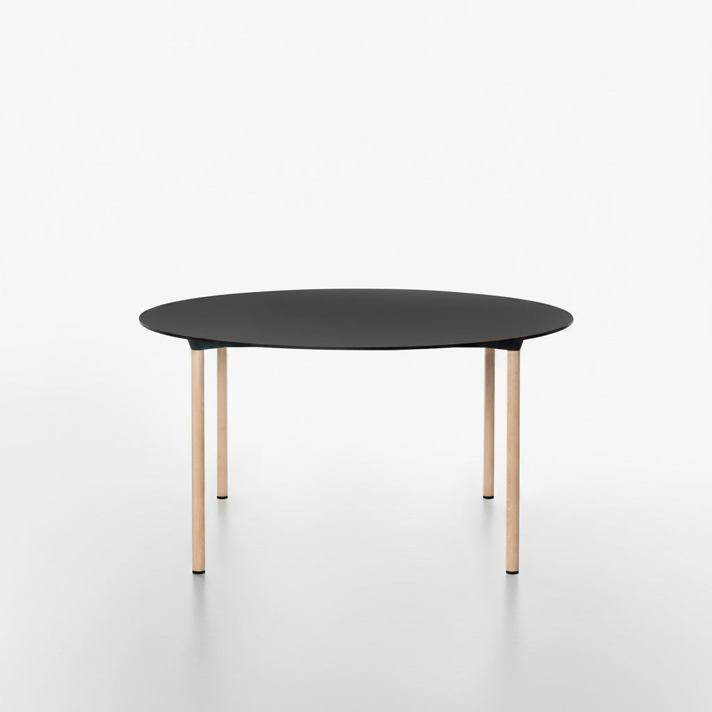 MONZA round table with black HPL table top and ash natural lacquered legs on a white background