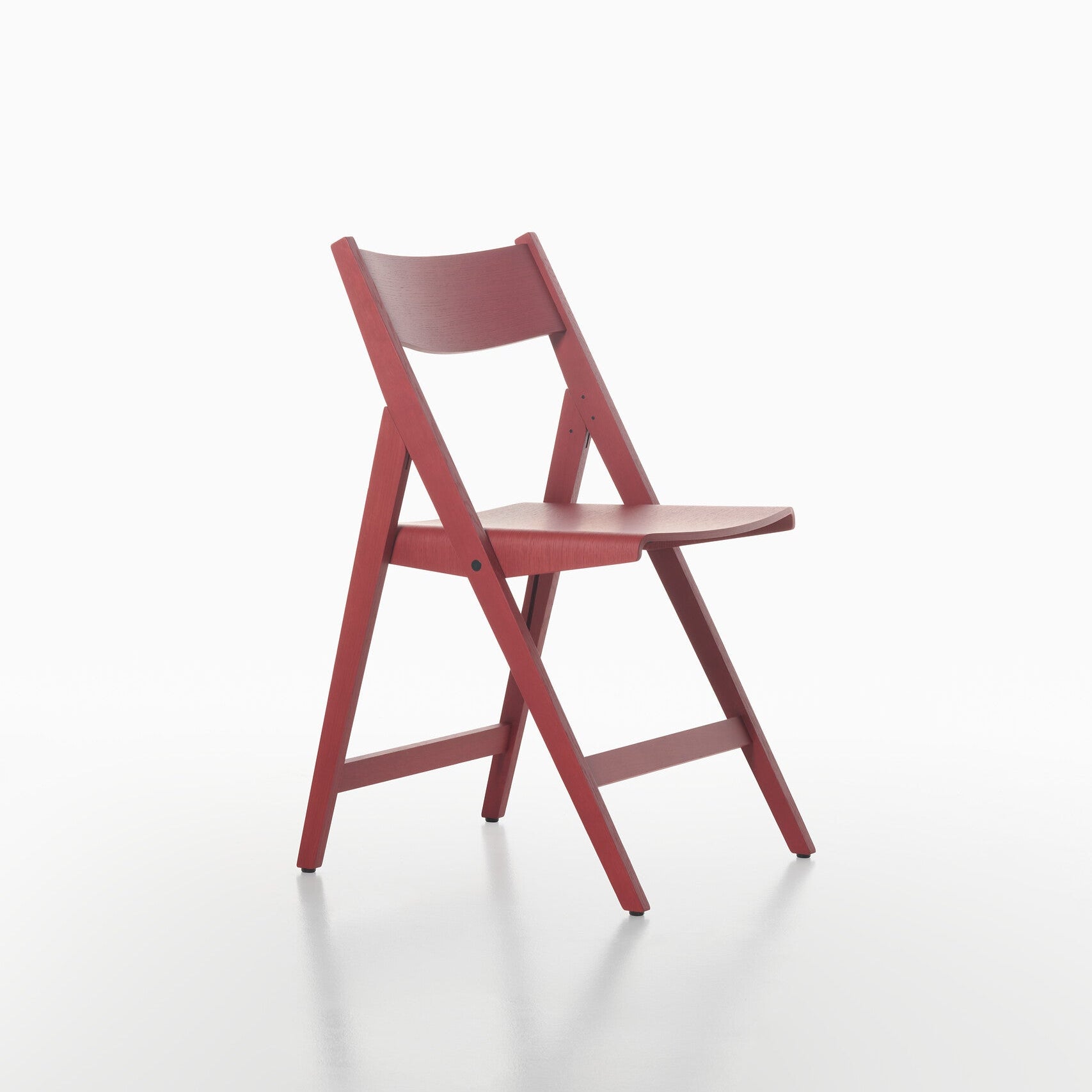 Red THEO folding chair on a white background