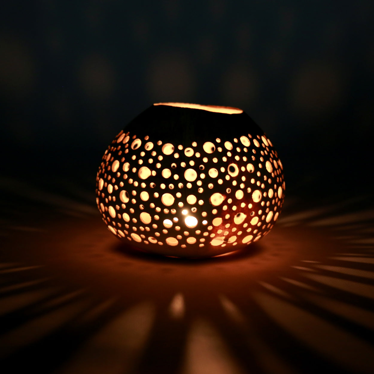 THE COCONUT DOT Candleholder-Natural light with candle in, front view