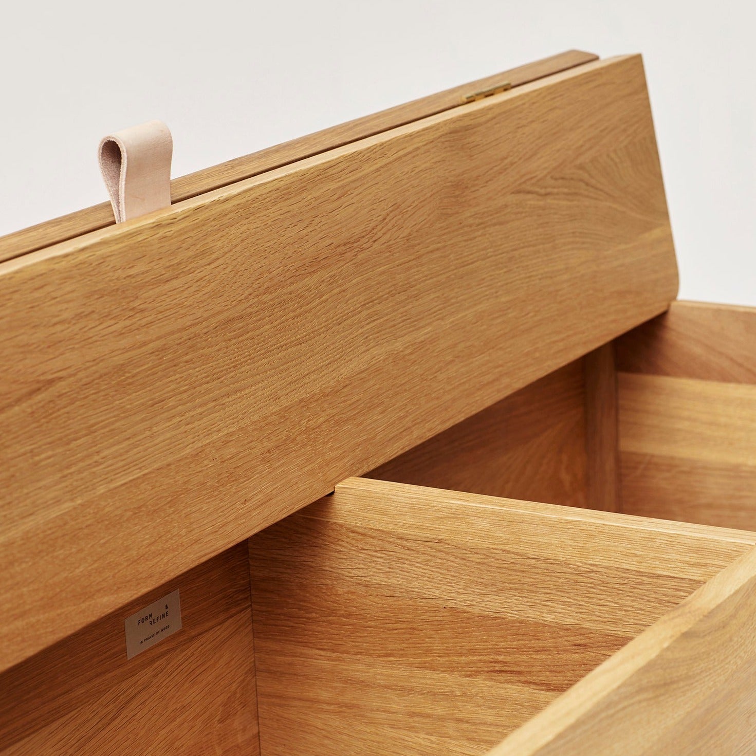 A LINE Storage Bench folded view of natural finish
