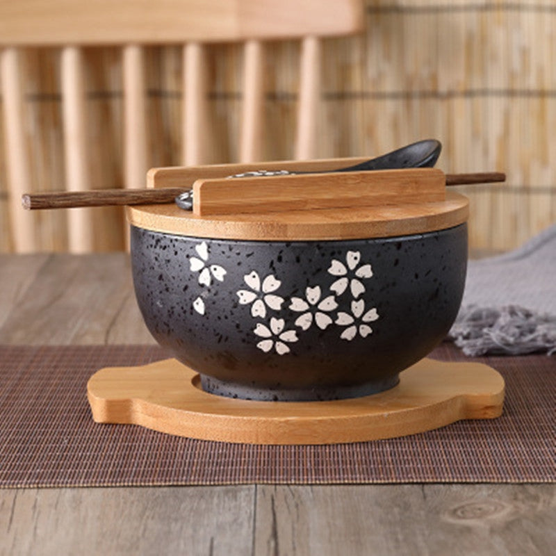 Ciotola in ceramica giapponese con bacchetta e cucchiaio