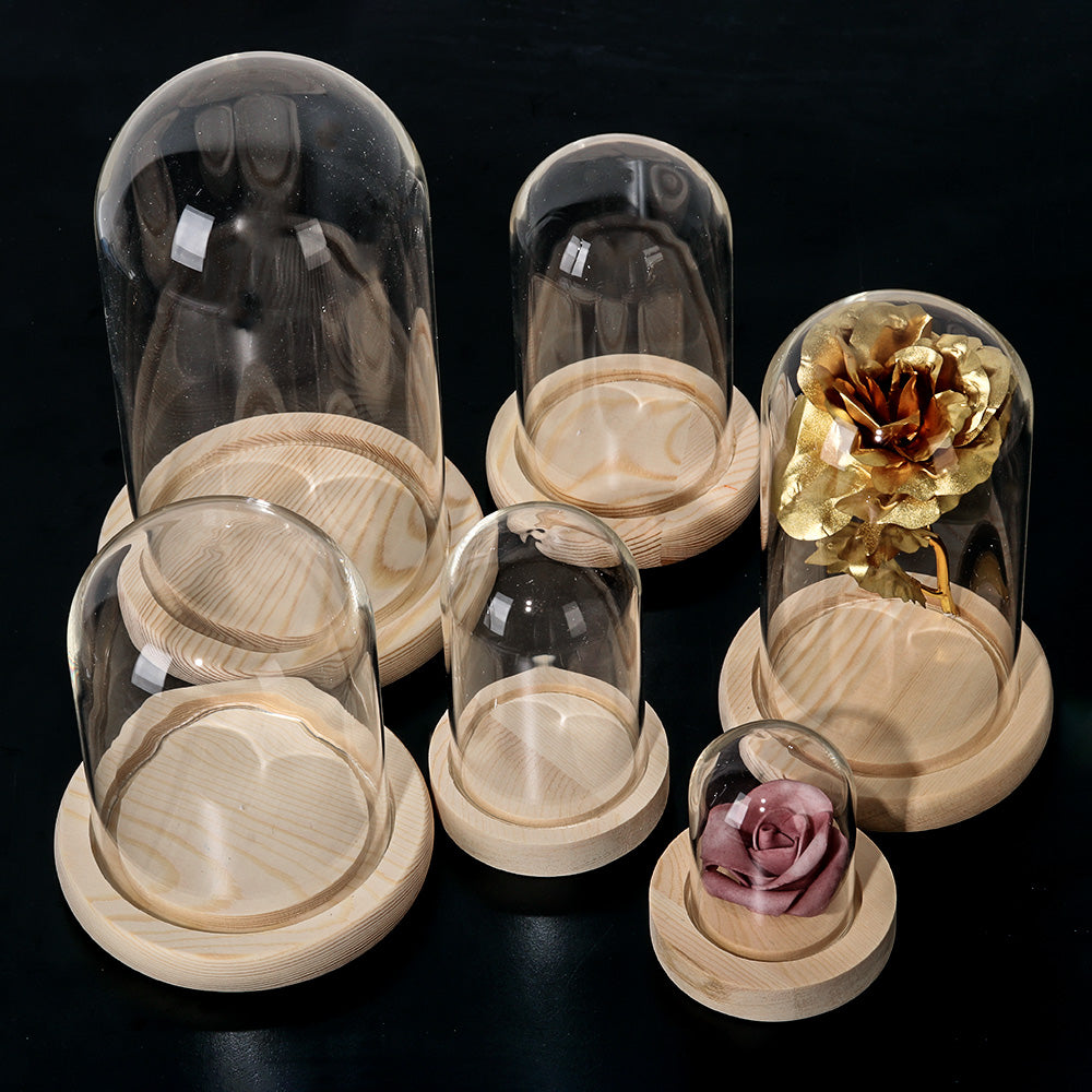 Vaso per fiori in vetro con base in legno